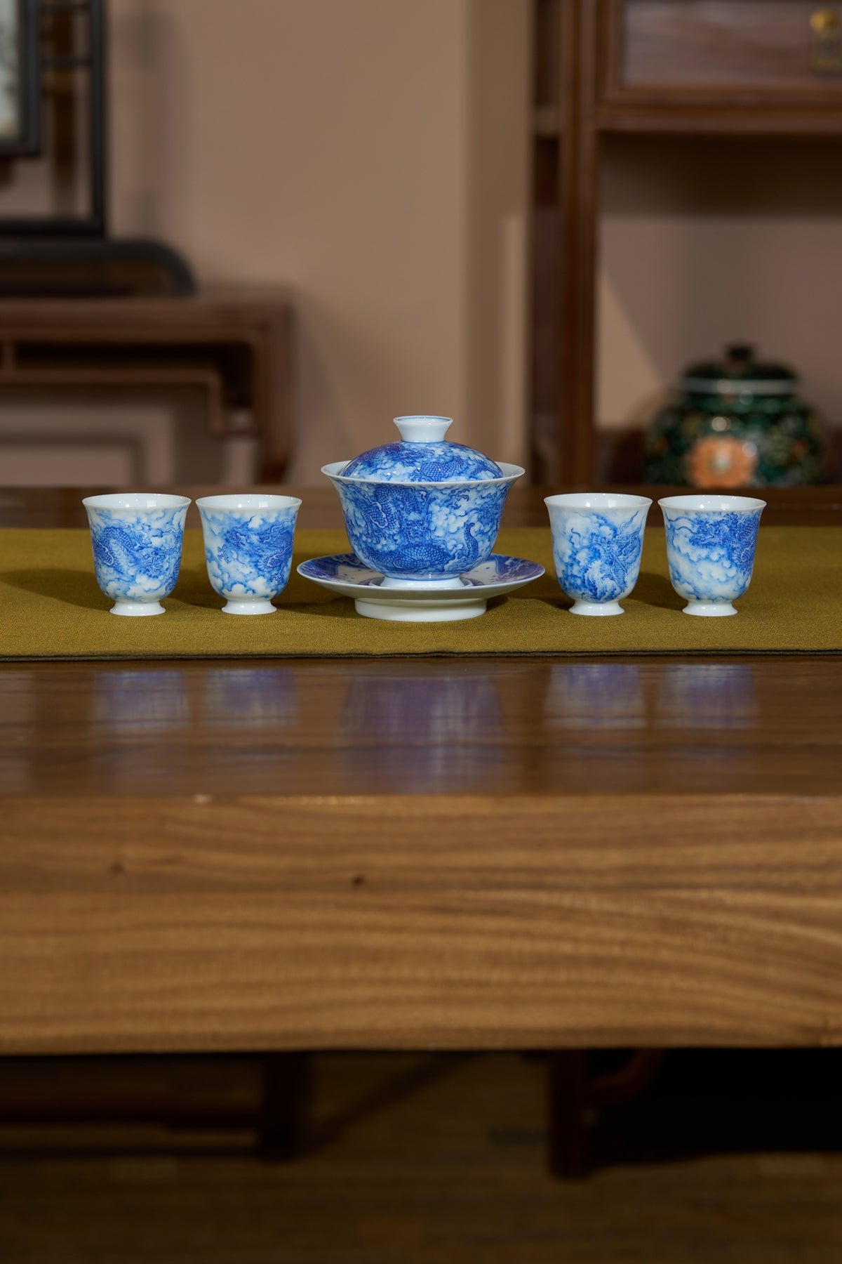 Original photograph of blue and white teaware on a wooden surface