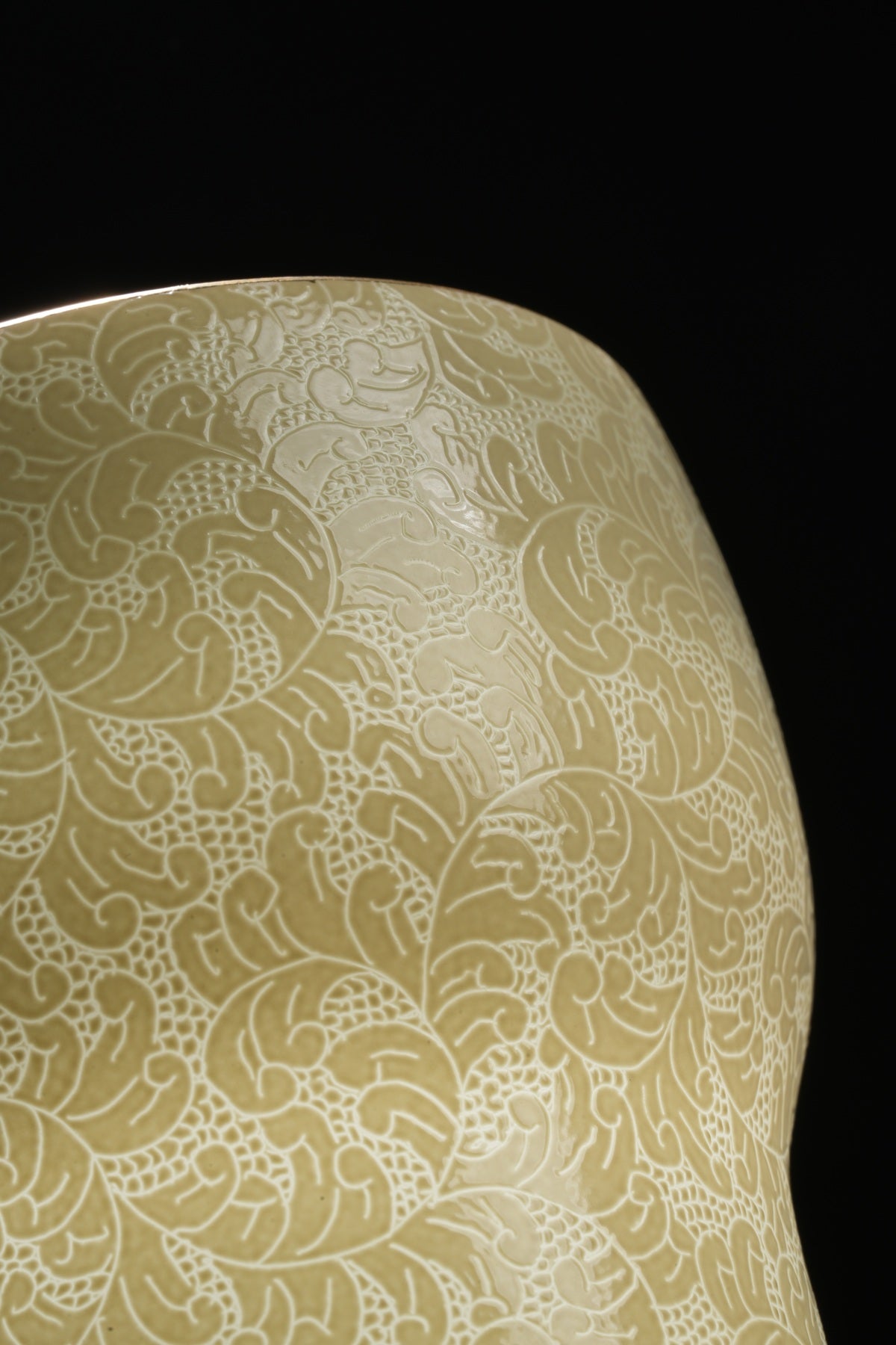 Actual close-up photograph of the patterned yellow cup
